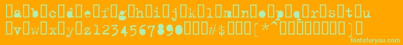 Trixieextra-Schriftart – Grüne Schriften auf orangefarbenem Hintergrund