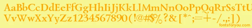 フォントLazursk7 – オレンジの文字が黄色の背景にあります。