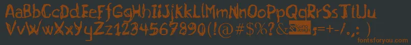 Czcionka Gurunge – brązowe czcionki na czarnym tle