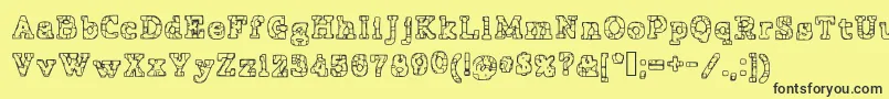 PrisonTattoo Font – Black Fonts on Yellow Background