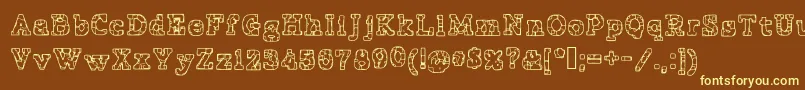 Fonte PrisonTattoo – fontes amarelas em um fundo marrom