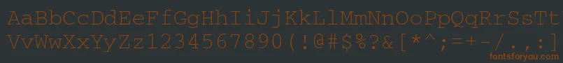 Шрифт Couriercftt – коричневые шрифты на чёрном фоне