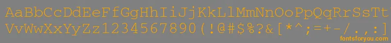 フォントCouriercftt – オレンジの文字は灰色の背景にあります。