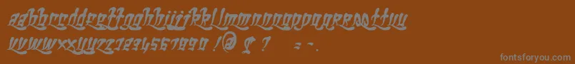 GhettoFabulous-fontti – harmaat kirjasimet ruskealla taustalla