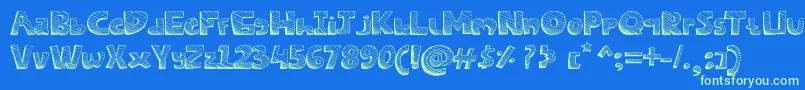 Czcionka SketchesFont – zielone czcionki na niebieskim tle