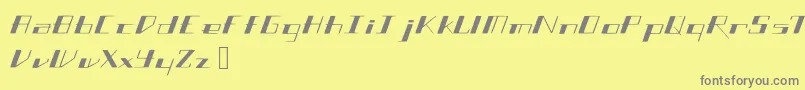 Slantgeo-fontti – harmaat kirjasimet keltaisella taustalla