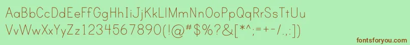 Шрифт PrintClearlyOt – коричневые шрифты на зелёном фоне
