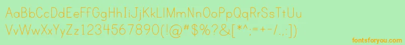 フォントPrintClearlyOt – オレンジの文字が緑の背景にあります。