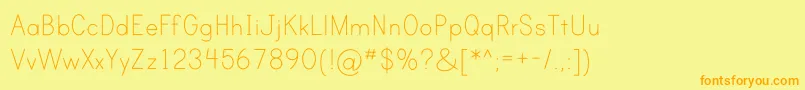 フォントPrintClearlyOt – オレンジの文字が黄色の背景にあります。