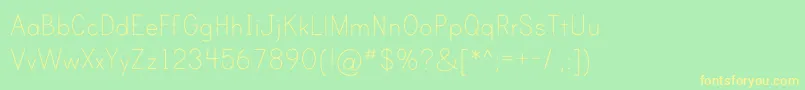 PrintClearlyOt-fontti – keltaiset fontit vihreällä taustalla