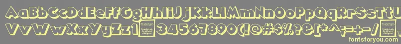 Шрифт AngellaOutlineDemo – жёлтые шрифты на сером фоне