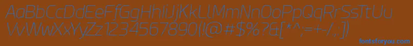EsphimereThinItalic Font – Blue Fonts on Brown Background