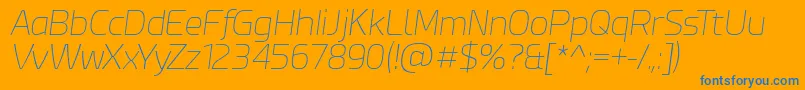 EsphimereThinItalic-fontti – siniset fontit oranssilla taustalla