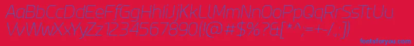 EsphimereThinItalic Font – Blue Fonts on Red Background