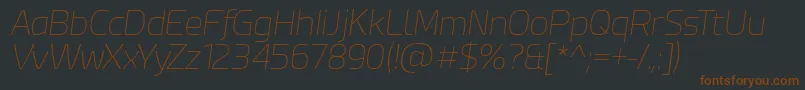 EsphimereThinItalic-fontti – ruskeat fontit mustalla taustalla