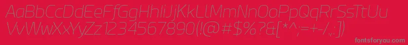 EsphimereThinItalic-fontti – harmaat kirjasimet punaisella taustalla