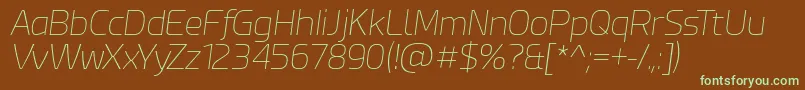 EsphimereThinItalic-fontti – vihreät fontit ruskealla taustalla