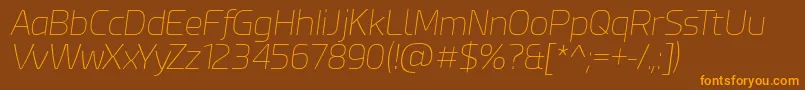 Czcionka EsphimereThinItalic – pomarańczowe czcionki na brązowym tle