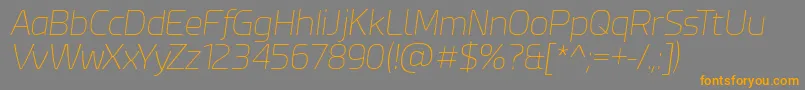 フォントEsphimereThinItalic – オレンジの文字は灰色の背景にあります。