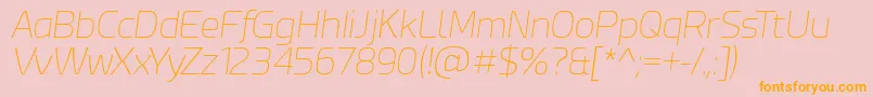 フォントEsphimereThinItalic – オレンジの文字がピンクの背景にあります。
