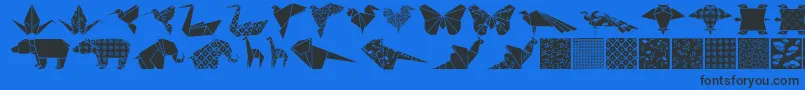 Czcionka Origamibats – czarne czcionki na niebieskim tle