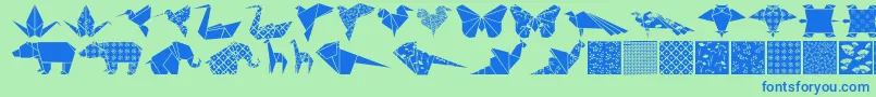 Więcej informacji o czcionce Origamibats Czcionka Origamibats – niebieskie czcionki na zielonym tle