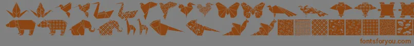 Czcionka Origamibats – brązowe czcionki na szarym tle