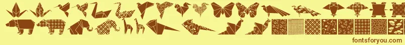Więcej informacji o czcionce Origamibats Czcionka Origamibats – brązowe czcionki na żółtym tle