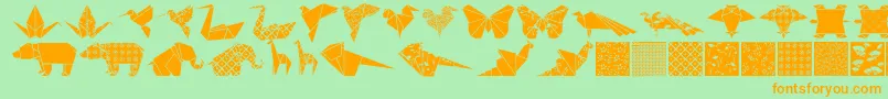 Czcionka Origamibats – pomarańczowe czcionki na zielonym tle