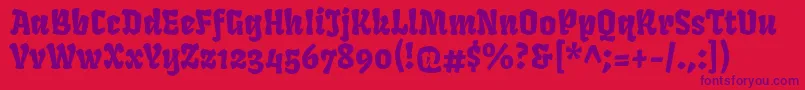 Czcionka FrukturRegular – fioletowe czcionki na czerwonym tle