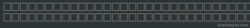 フォントAlawi34 – 黒い背景に灰色の文字