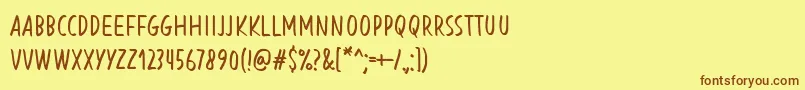 Fonte BlessingInDisguiseRegular – fontes marrons em um fundo amarelo