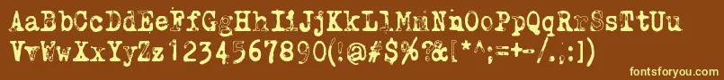 WhyDoWeBlinkSoFrequentlyJungle-fontti – keltaiset fontit ruskealla taustalla