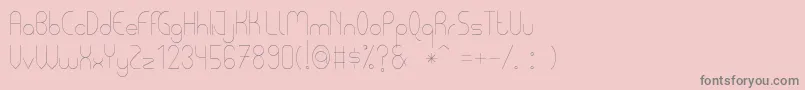 PycuafLightTfb-Schriftart – Graue Schriften auf rosa Hintergrund