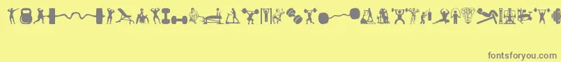 Gym-fontti – harmaat kirjasimet keltaisella taustalla