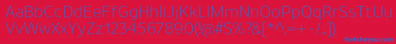 UnimanLight-Schriftart – Blaue Schriften auf rotem Hintergrund