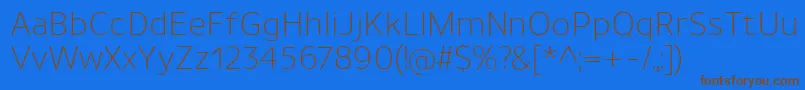 UnimanLight-Schriftart – Braune Schriften auf blauem Hintergrund
