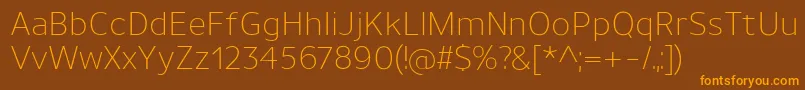 UnimanLight Font – Orange Fonts on Brown Background