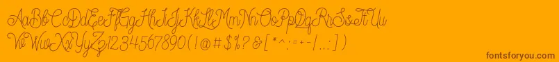 Шрифт Dreamcatcherspersonaluse – коричневые шрифты на оранжевом фоне