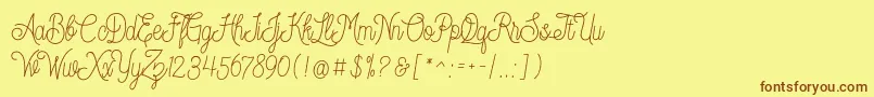 Dreamcatcherspersonaluse Font – Brown Fonts on Yellow Background