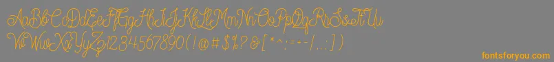 Dreamcatcherspersonaluse Font – Orange Fonts on Gray Background