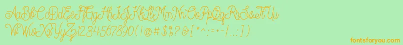 Dreamcatcherspersonaluse Font – Orange Fonts on Green Background