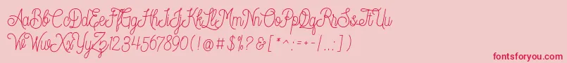 Dreamcatcherspersonaluse-Schriftart – Rote Schriften auf rosa Hintergrund