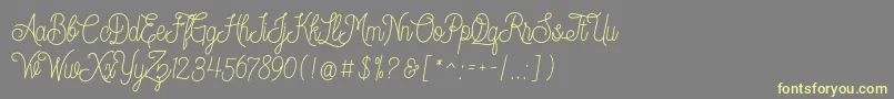 Dreamcatcherspersonaluse Font – Yellow Fonts on Gray Background