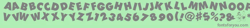 Devo Font – Gray Fonts on Green Background