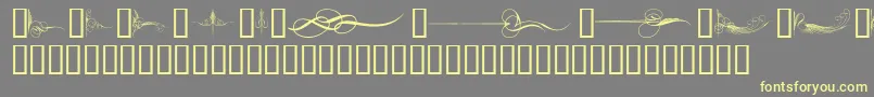 CurlyArtNouveau Font – Yellow Fonts on Gray Background