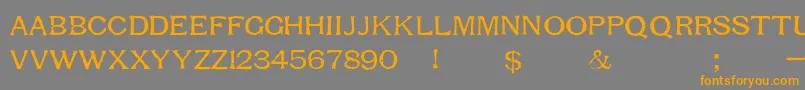 フォントRespessCapitalsMedium – オレンジの文字は灰色の背景にあります。