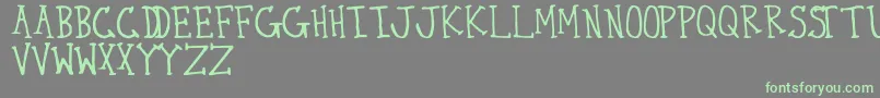 ThirtySeven Font – Green Fonts on Gray Background