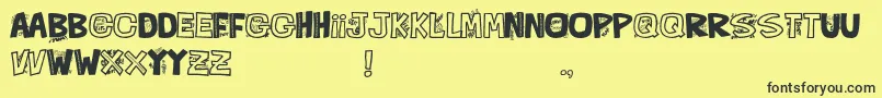 QueFontita21-fontti – mustat fontit keltaisella taustalla