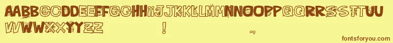 Czcionka QueFontita21 – brązowe czcionki na żółtym tle